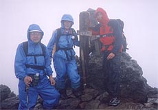 Kato-san and Kikuchu-san with Paul on top of Adatara-zan
